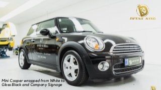 Mini Cooper wrapped from White to
Gloss Black and Company Signage
 