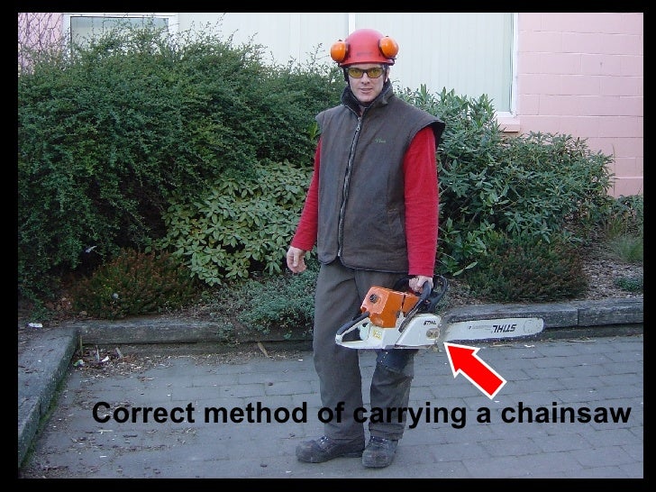 Carrying a chainsaw