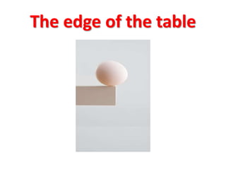 The edge of the table
 