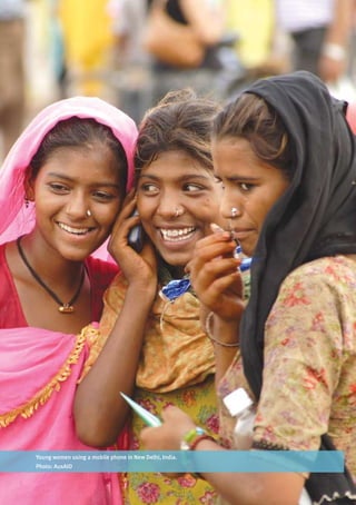 Young women using a mobile phone in New Delhi, India.
Photo: AusAID
 