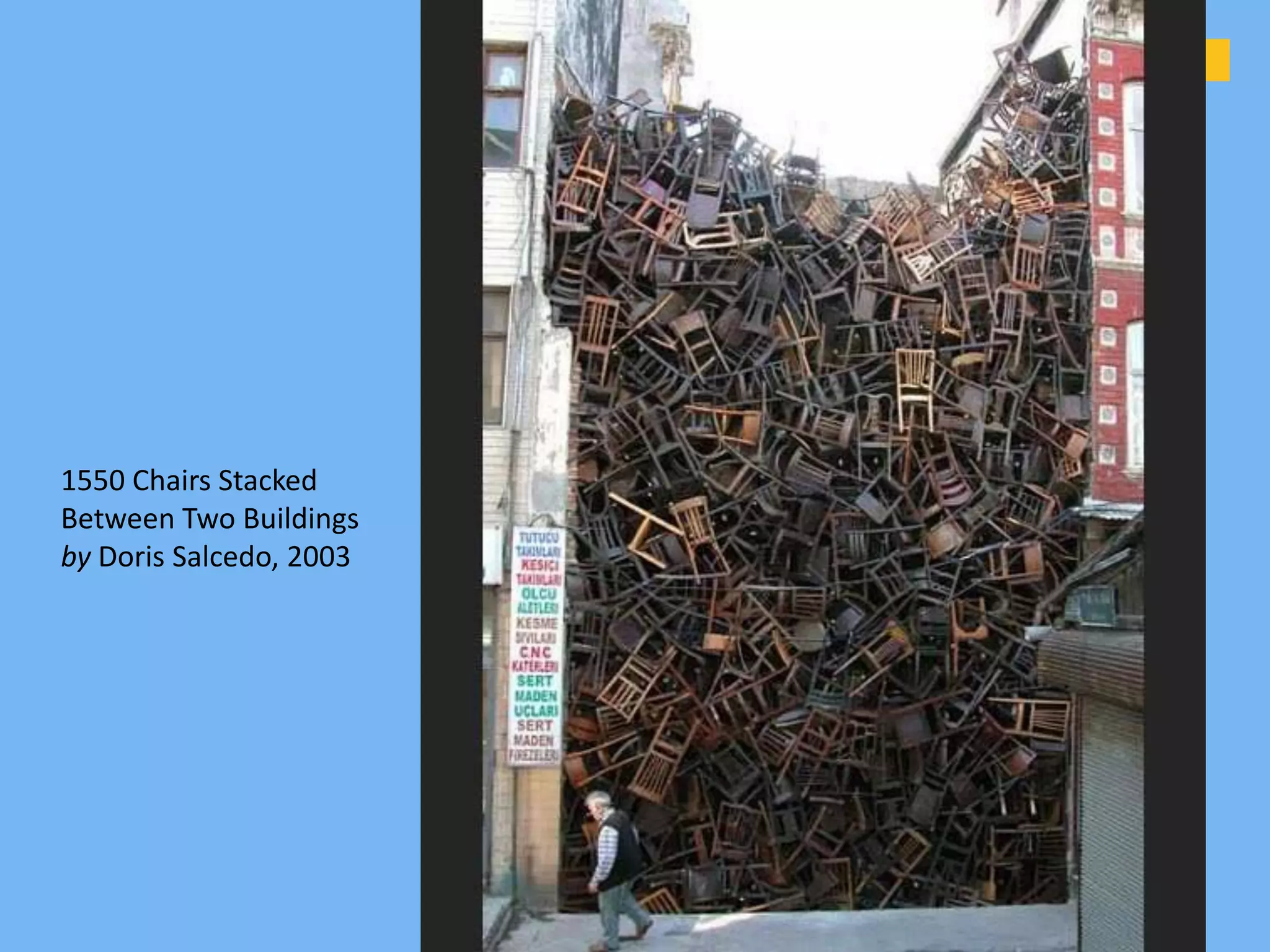 1550 Chairs Stacked
Between Two Buildings
by Doris Salcedo, 2003
 
