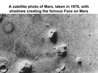 A satellite photo of Mars, taken in 1976, with shadows creating the famous Face on Mars 
