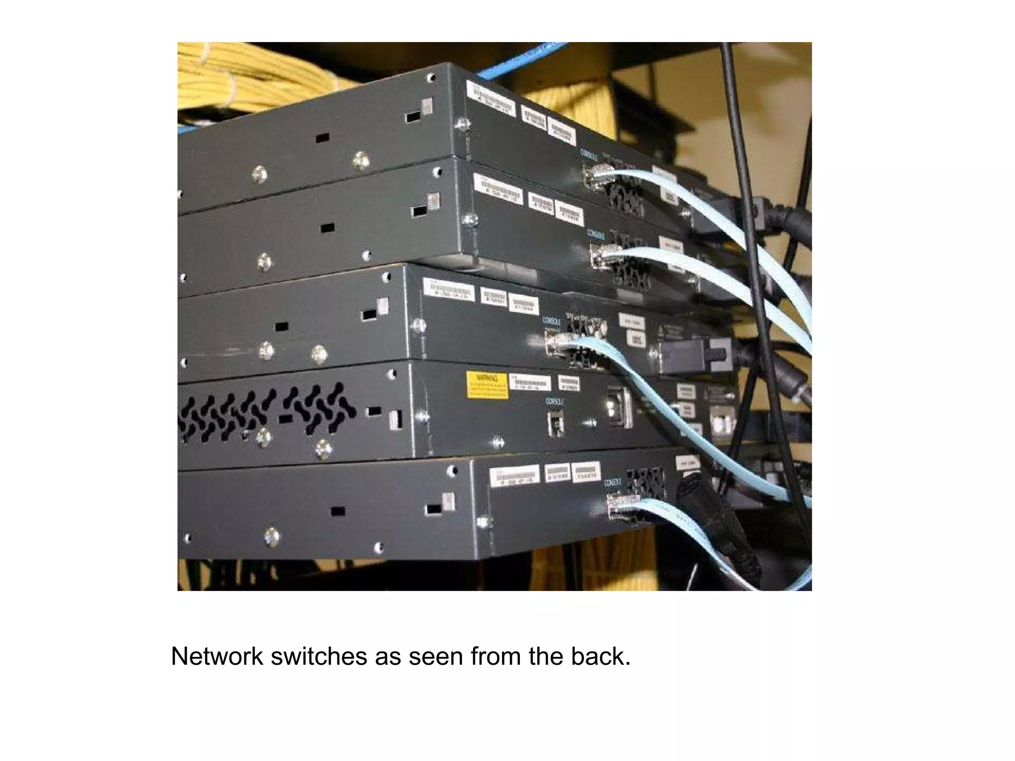 Network switches as seen from the back. 