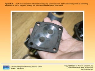 Figure 5-20  (a) A visual inspection indicated that this pump cover was worn. (b) An embedded particle of something was found on one of the gears, making this pump worthless except for scrap metal.   A 