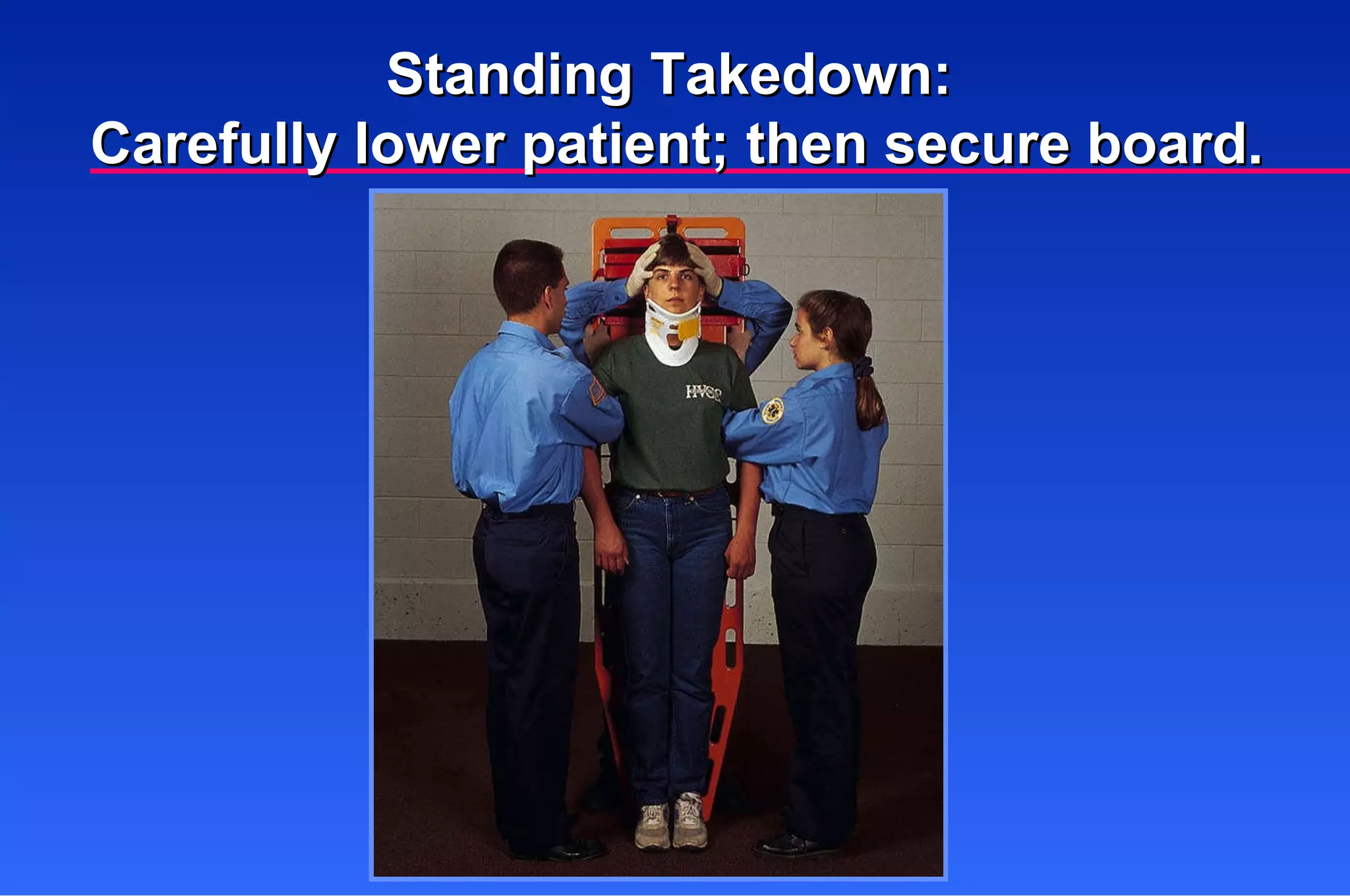 Standing Takedown:  Carefully lower patient; then secure board. 