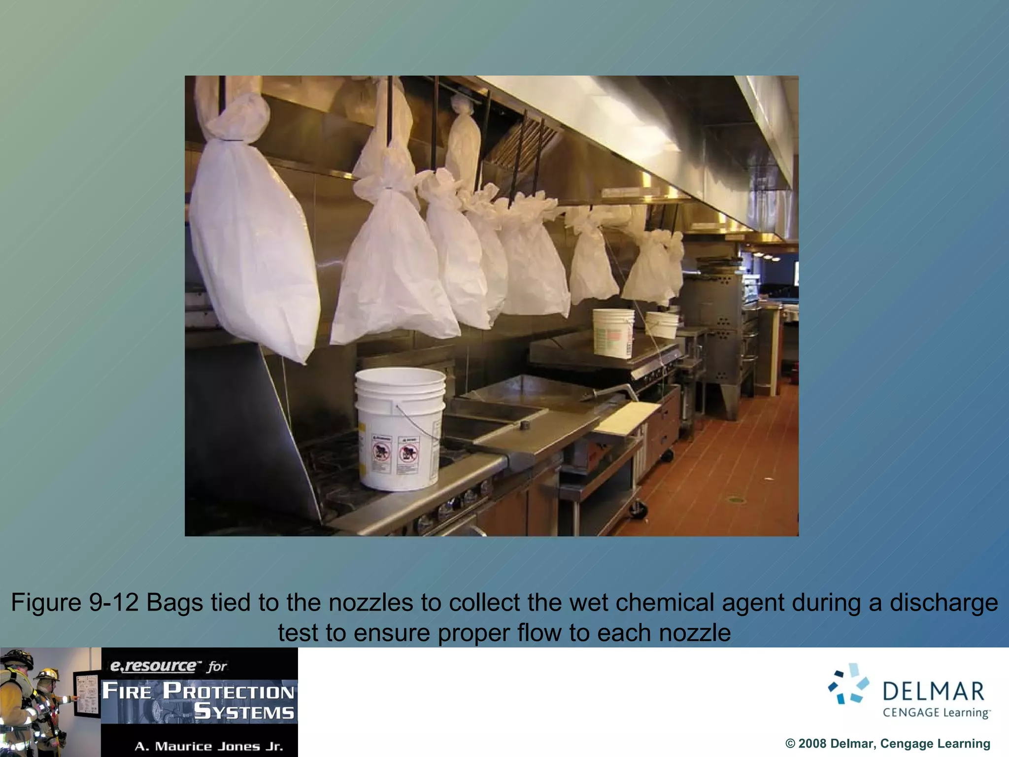 Figure 9-12 Bags tied to the nozzles to collect the wet chemical agent during a discharge test to ensure proper flow to each nozzle 