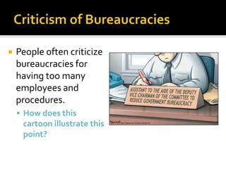  People often criticize
bureaucracies for
having too many
employees and
procedures.
 How does this
cartoon illustrate this
point?
 