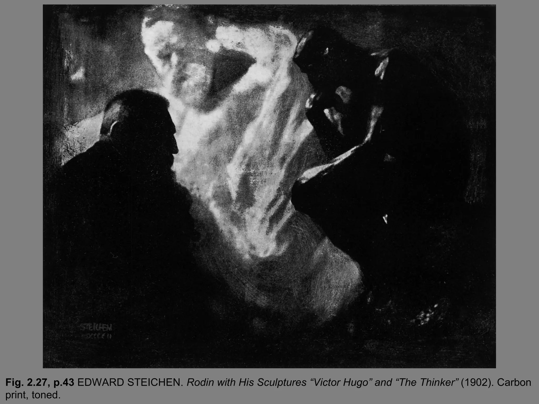 Fig. 2.27, p.43 EDWARD STEICHEN. Rodin with His Sculptures “Victor Hugo” and “The Thinker” (1902). Carbon
print, toned.
 