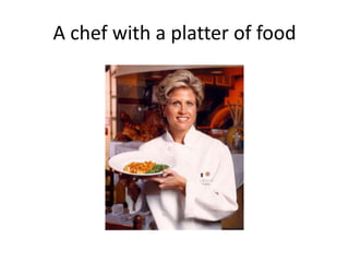 A chef with a platter of food