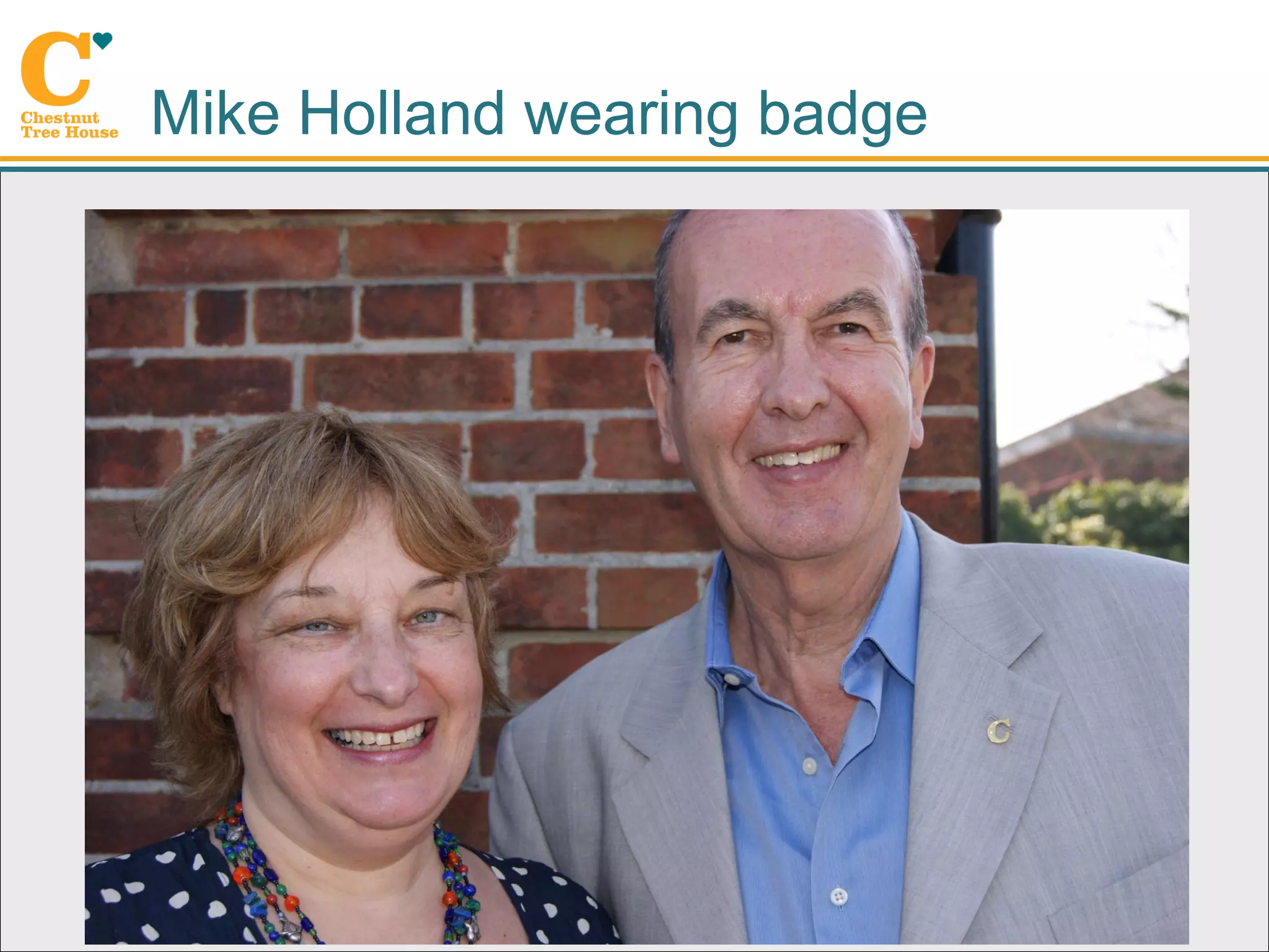 Mike Holland wearing badge
 