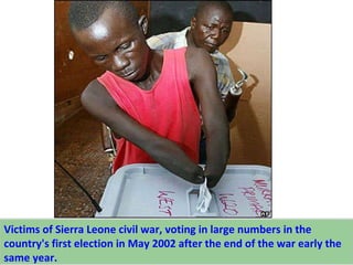 Victims of Sierra Leone civil war, voting in large numbers in the country's first election in May 2002 after the end of th...