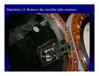 Operation 15: Remove the crossfire tube retainers
 