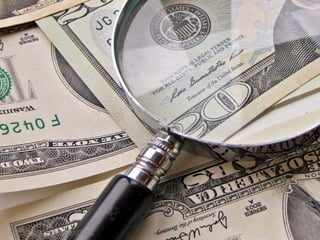 Image: Money and Magnifying Glass by Images of Money 
http://www.flickr.com/photos/59937401@N07/5858011914/ 
 