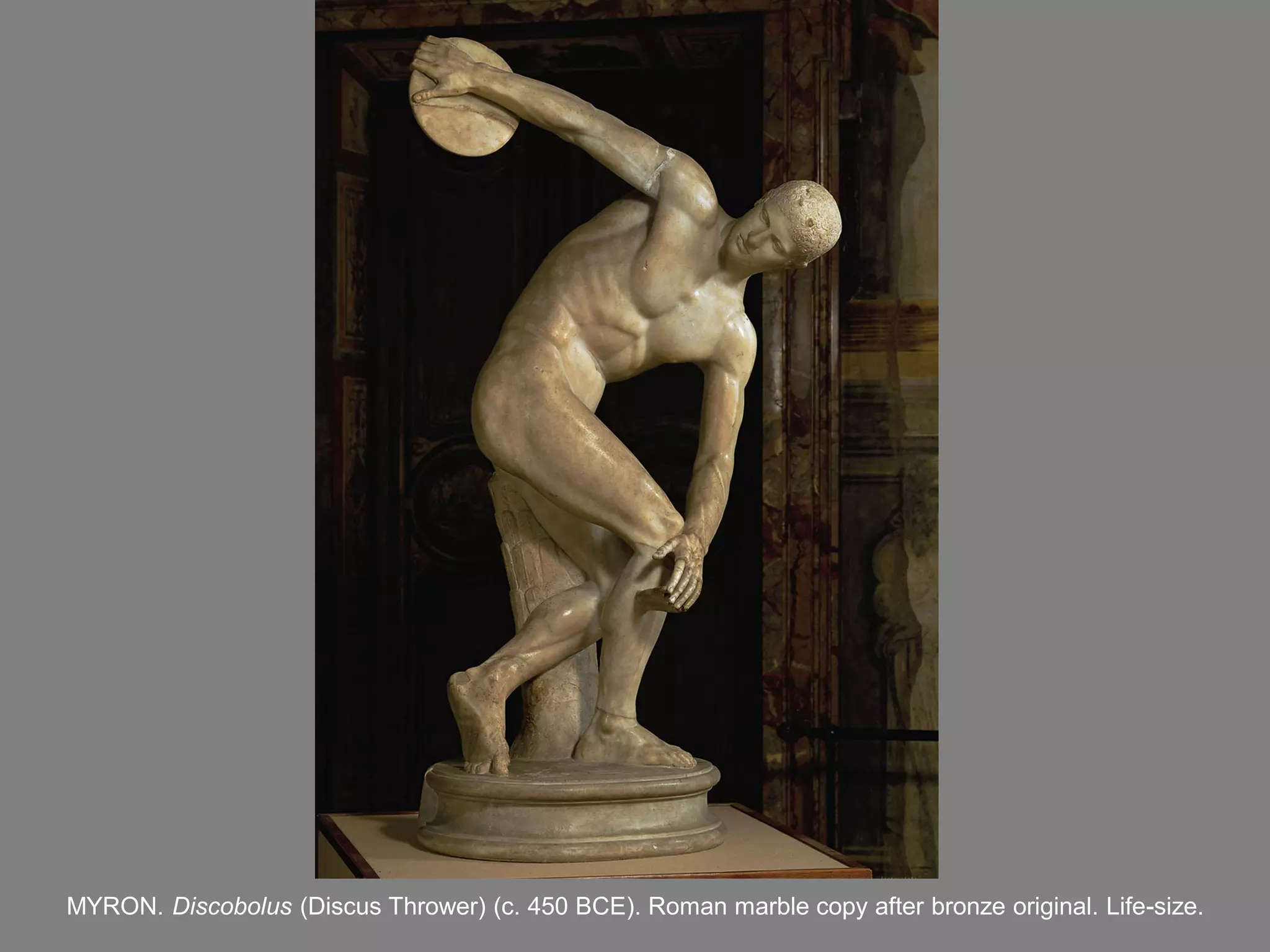 MYRON. Discobolus (Discus Thrower) (c. 450 BCE). Roman marble copy after bronze original. Life-size.
 