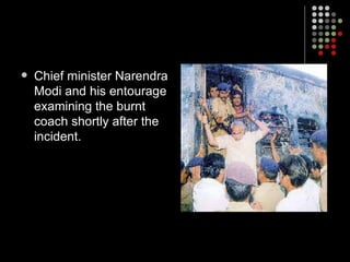 Chief minister Narendra Modi and his entourage examining the burnt coach shortly after the incident. 