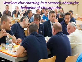 Workers chit chatting in a canteen about the
behavior of the superior
 