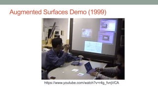 Augmented Surfaces Demo (1999)
https://www.youtube.com/watch?v=r4g_fvnjVCA
 