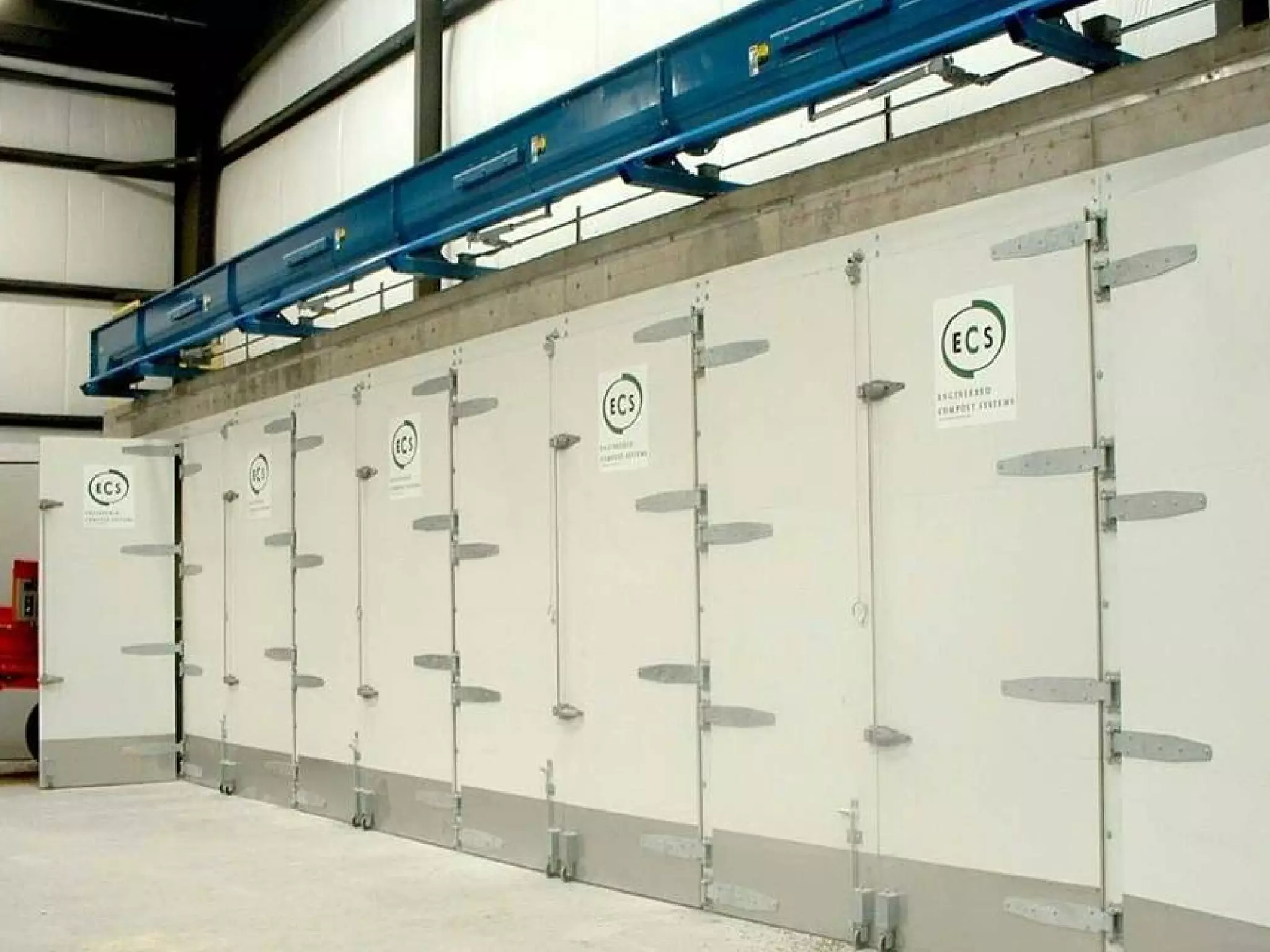 The facility is designed to process 45 tons/day of mixed organic waste. All process functions (pre-processing, composting, curing and product refining) are conducted within this building.  