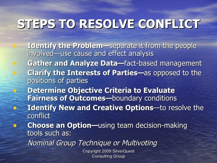 How should conflicts in team writing be resolved