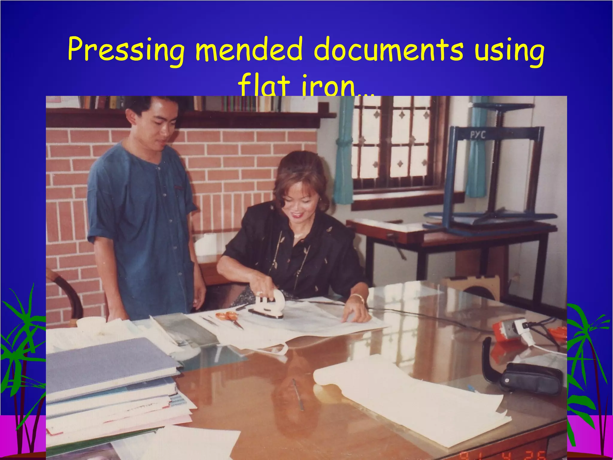 Pressing mended documents using
flat iron…
 