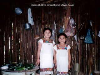 Xocen children in traditional Mayan house.
 