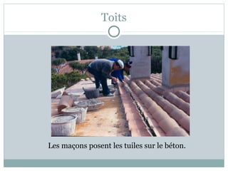 Toits
Les maçons posent les tuiles sur le béton.
 