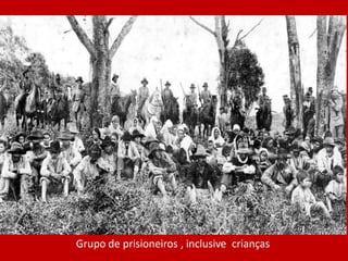 Grupo de prisioneiros , inclusive crianças
 