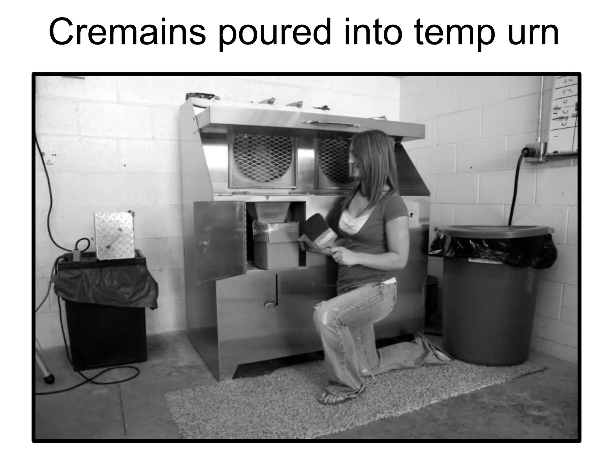 Cremains poured into temp urn
 