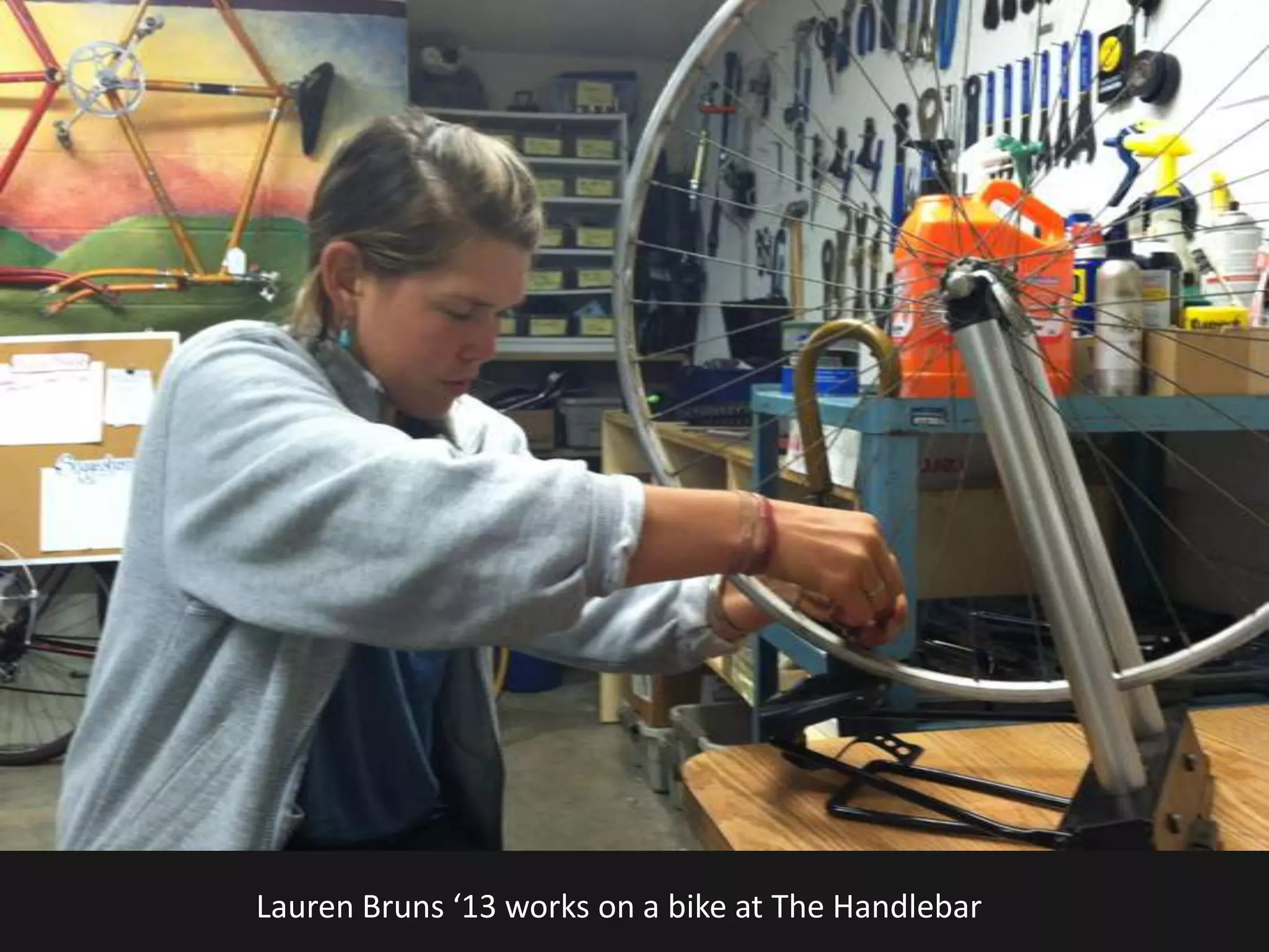 Lauren Bruns ‘13 works on a bike at The Handlebar
 