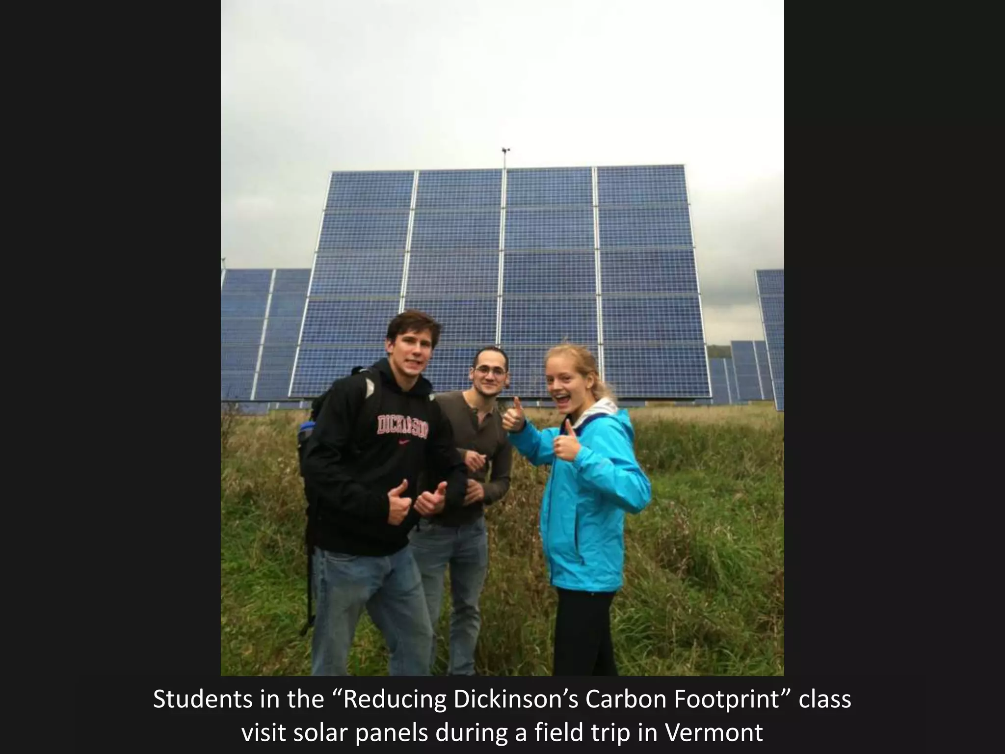 Students in the “Reducing Dickinson’s Carbon Footprint” class
       visit solar panels during a field trip in Vermont
 