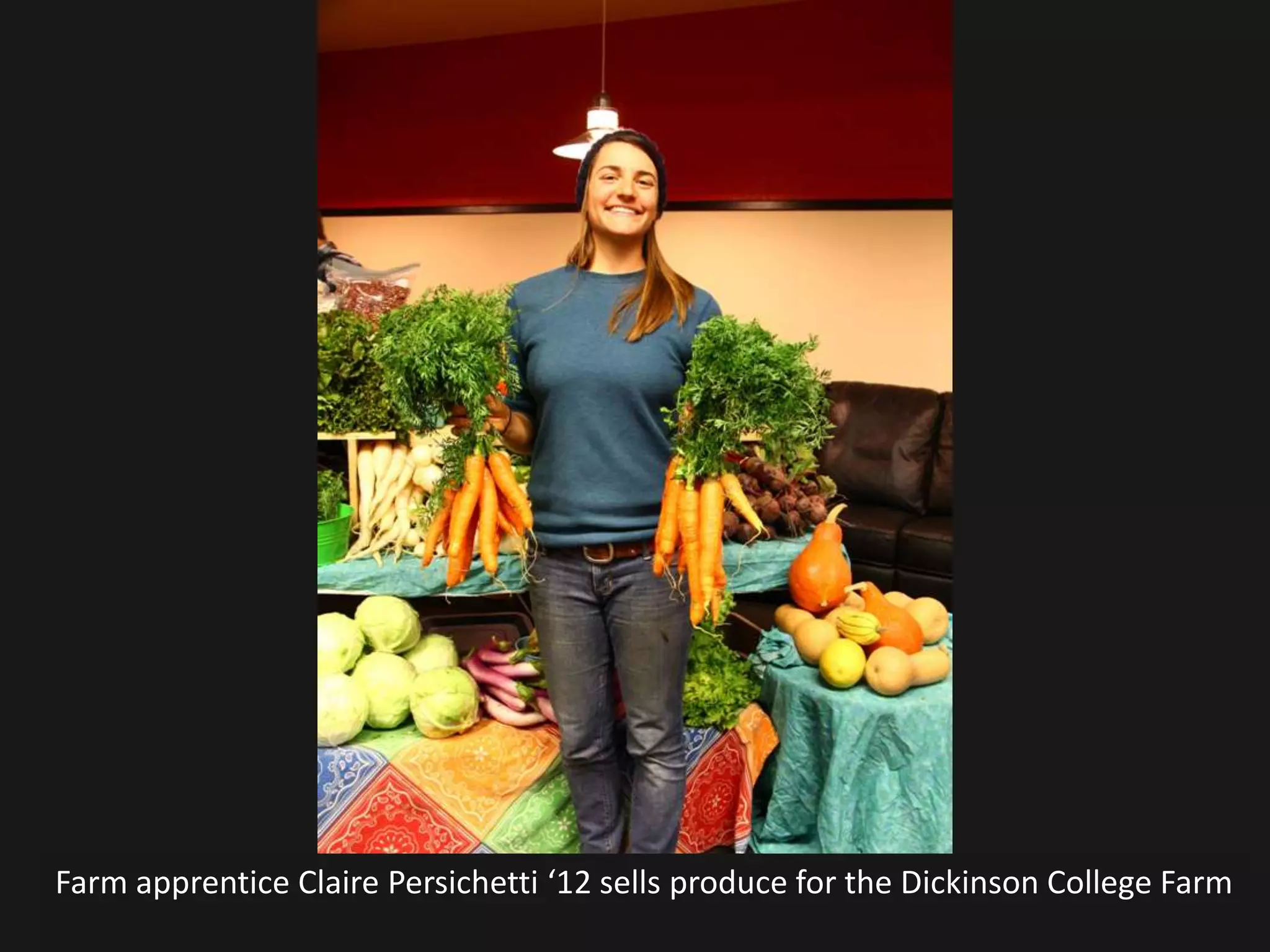 Farm apprentice Claire Persichetti ‘12 sells produce for the Dickinson College Farm
 