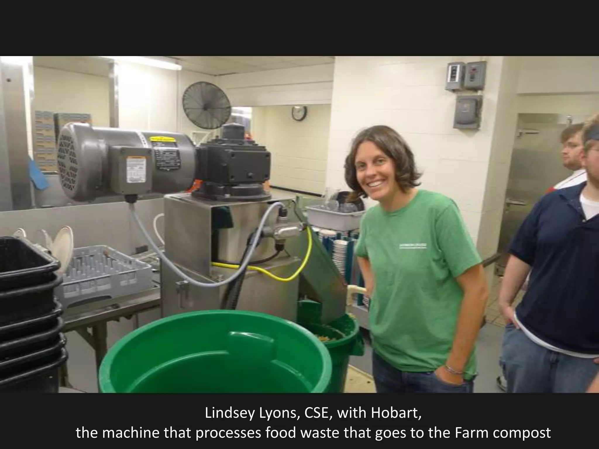Lindsey Lyons, CSE, with Hobart,
the machine that processes food waste that goes to the Farm compost
 