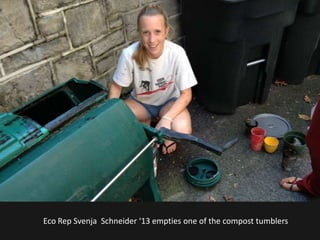 Eco Rep Svenja Schneider ‘13 empties one of the compost tumblers
 