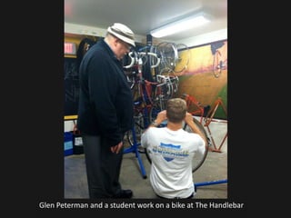 Glen Peterman and a student work on a bike at The Handlebar
 