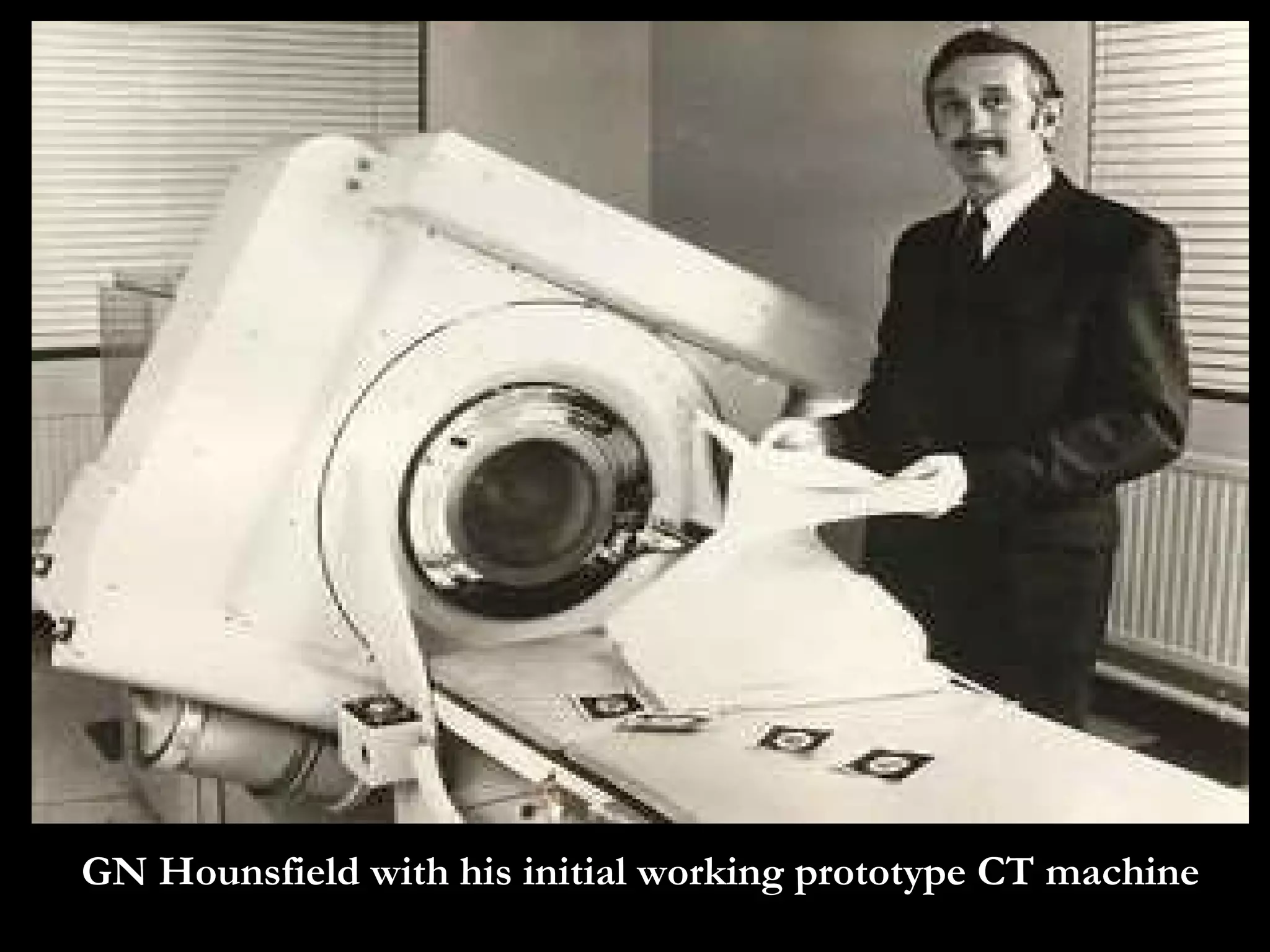 GN Hounsfield with his initial working prototype CT machine 