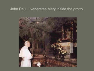 John Paul II venerates Mary inside the grotto.
 