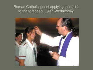 Roman Catholic priest applying the cross
to the forehead …Ash Wednesday.
 