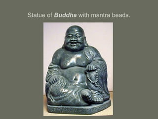 Statue of Buddha with mantra beads.
 