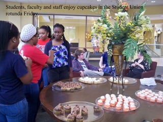 Students, faculty and staff enjoy cupcakes in the Student Union
rotunda Friday.