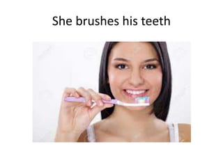 She brushes his teeth
 