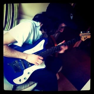 Danny playing guitar