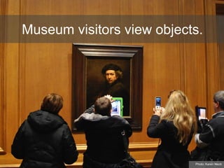 Museum visitors view objects.
Photo: Karen Neoh
 