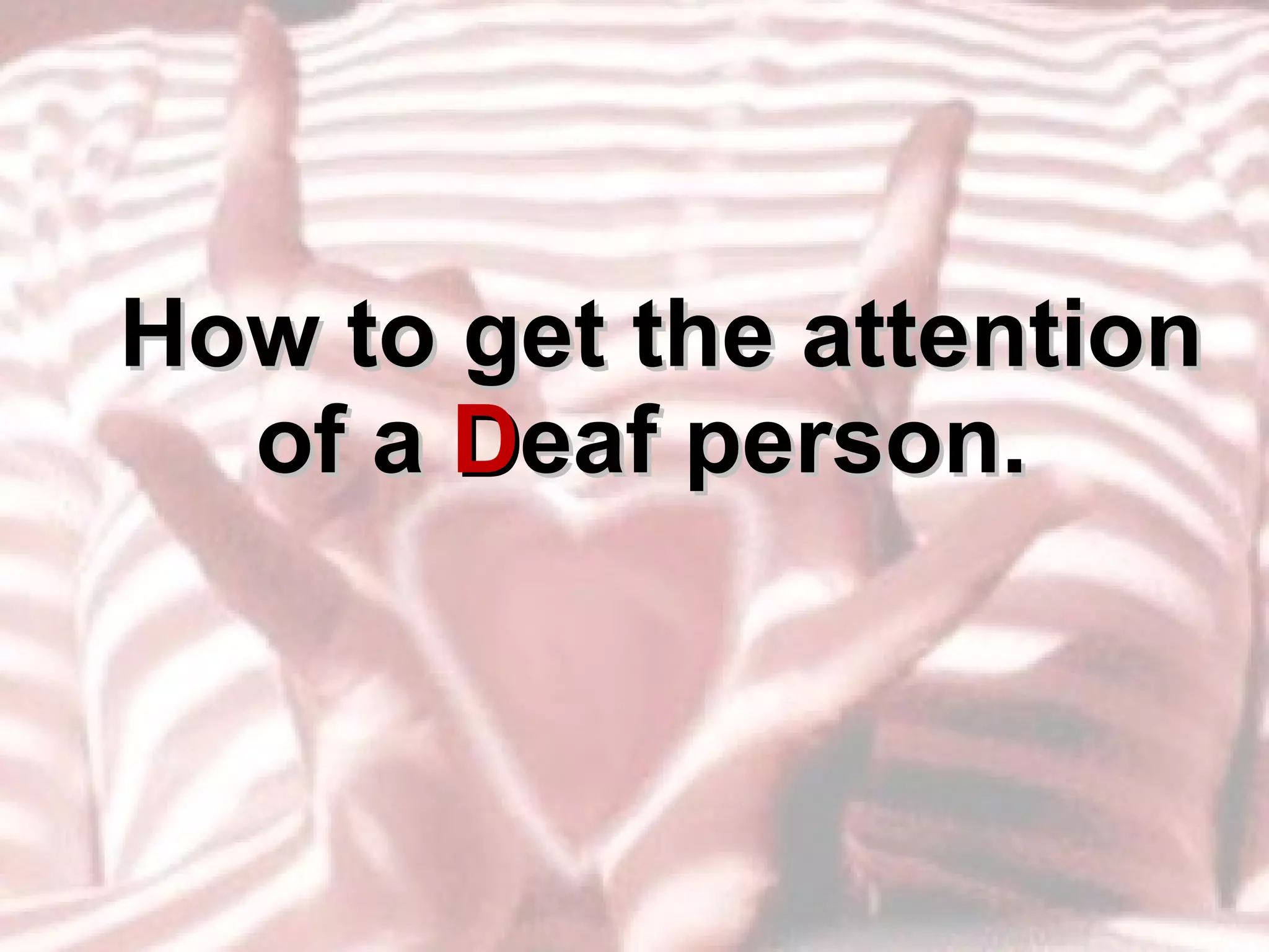 How to get the attention of a  D eaf person.   