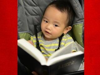 Child reading a Bible**
 