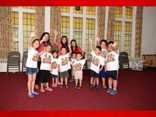 Kids waving at the camera
 