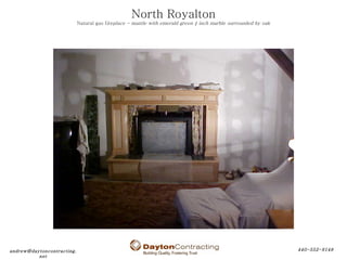 North Royalton Natural gas f ireplace - mantle with emerald green ¾ inch marble surrounded by oak 