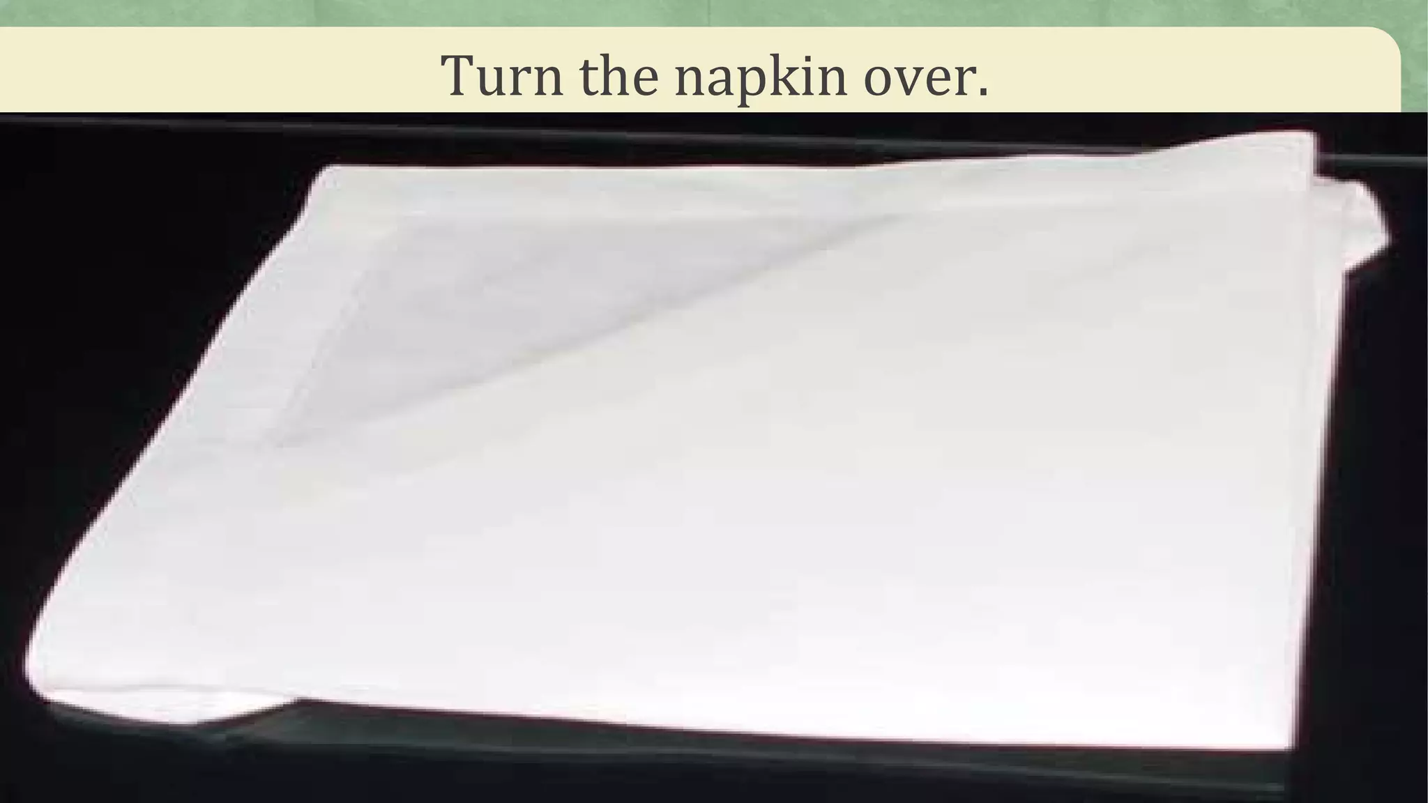 Turn the napkin over.
 