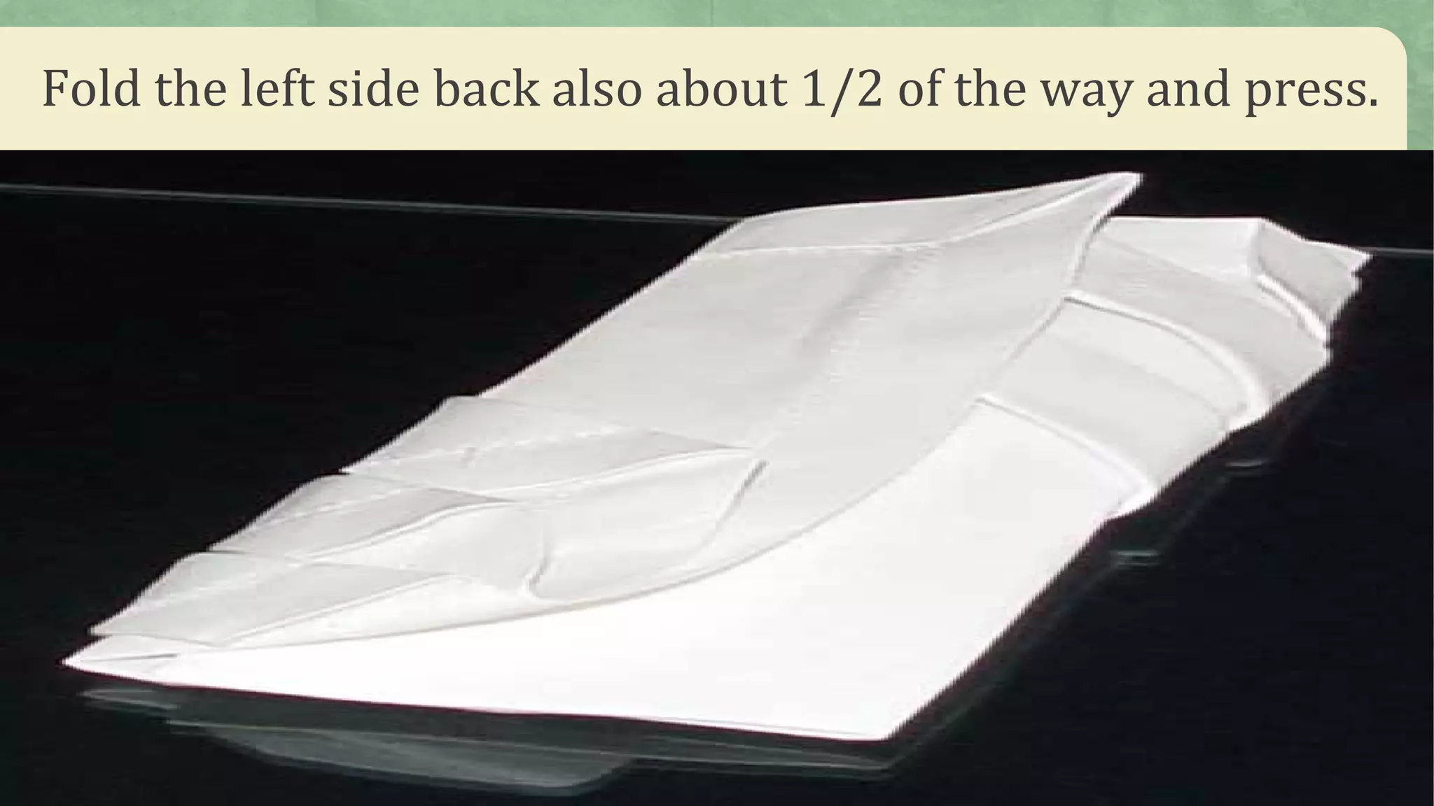 Fold the left side back also about 1/2 of the way and press.
 