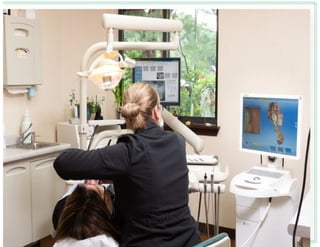 Dental assistant working on dental crowns patient at Zubkov Dental