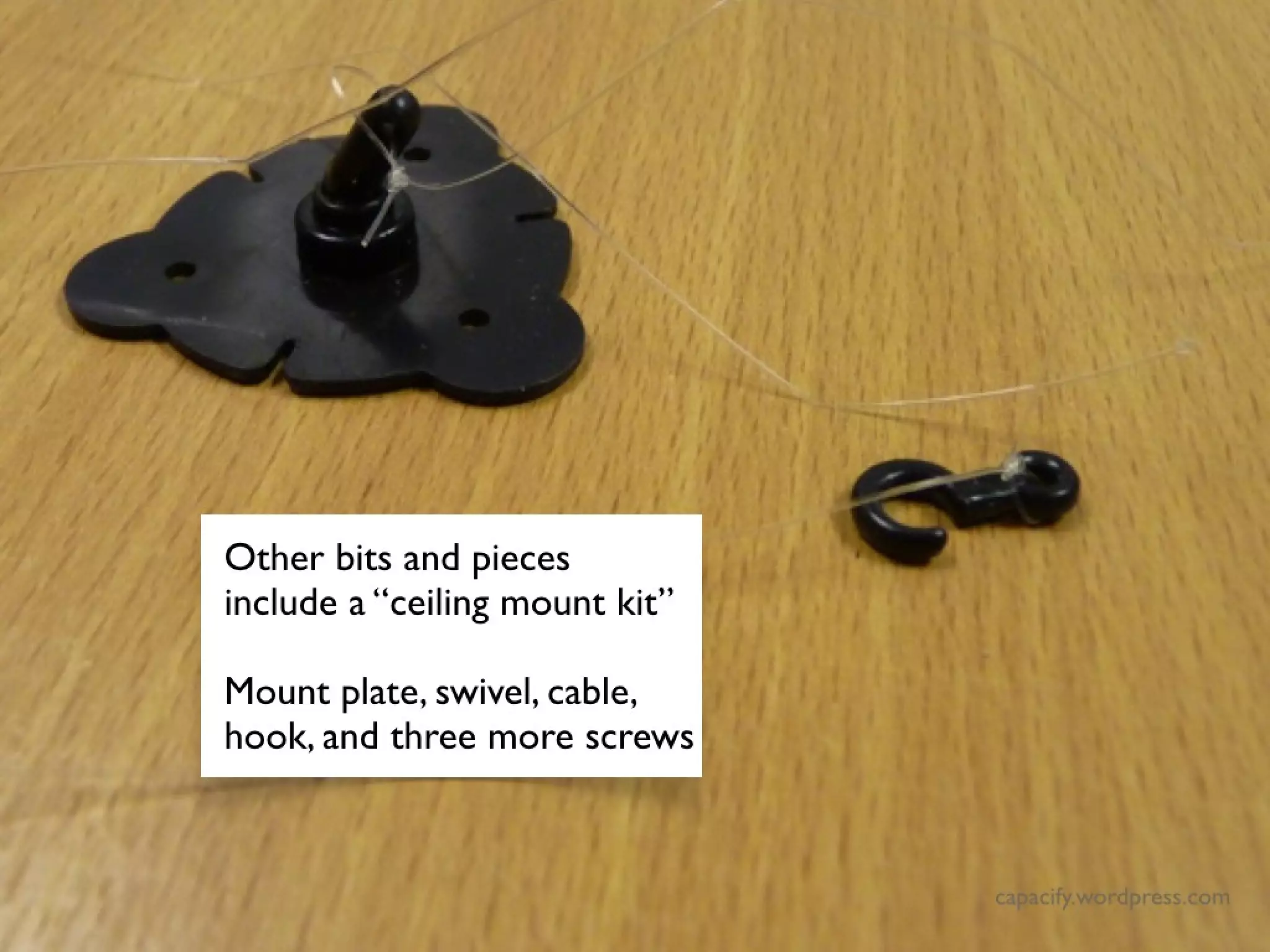 Other bits and pieces include
a “ceiling mount kit”
Mount plate, swivel, cable,
hook, and three more screws
Other bits and pieces include
a “ceiling mount kit”
Mount plate, swivel, cable,
hook, and three more screws
 